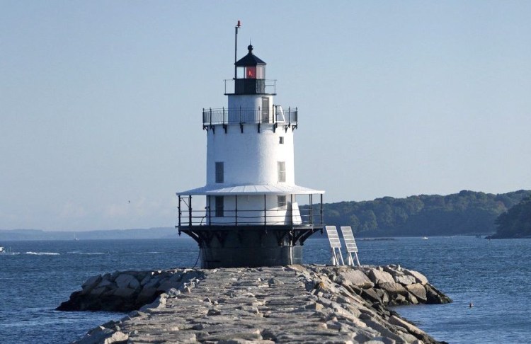 The missing 120-year-old Fresnel lens was installed in 1897 at the Spring Point Ledge Lighthouse, above, and served as a beacon for mariners coming into Portland Harbor. <em>Shawn Patrick Ouellette/Staff Photographer</em>