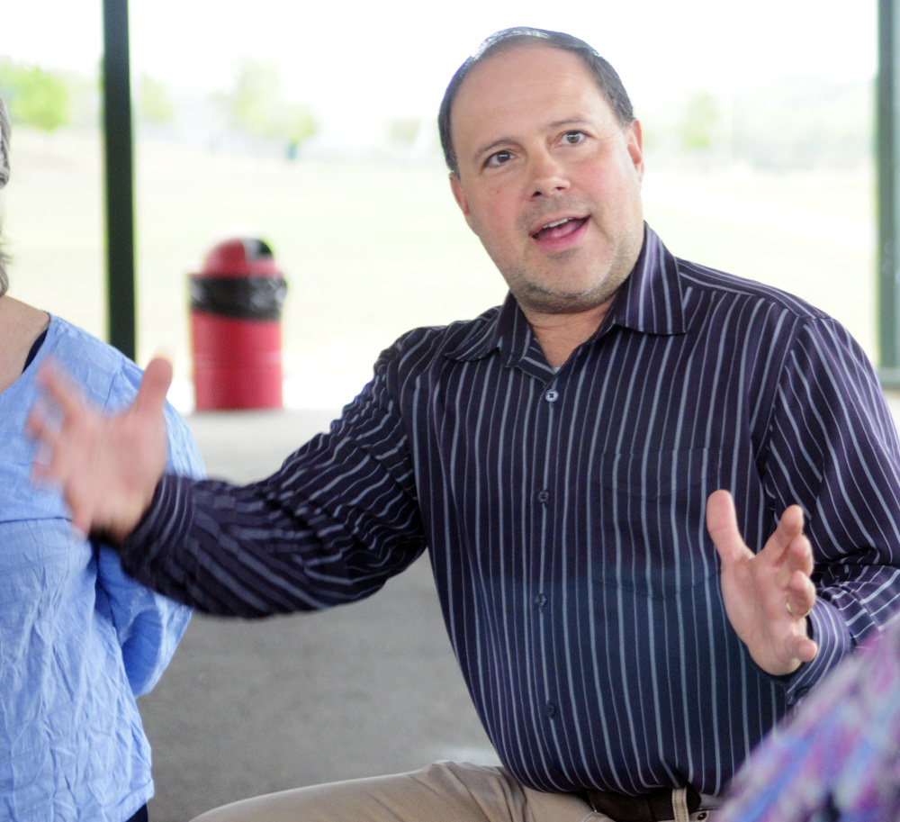 Dr. Michael Dufresne speaks during The Addict's Mom Light of Hope event Saturday in Mill Park in Augusta.