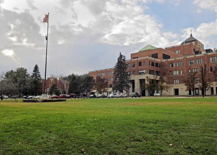 This 2014 file photo shows the main hospital building, at right, on the VA Maine Healthcare Systems-Togus, where a ceremony is planned for Saturday to mark the institution's 150 years of service.