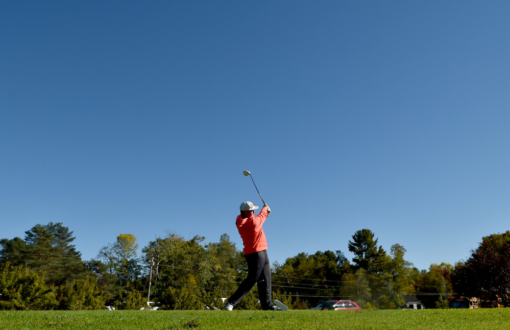 Erskine junior Aaron Pion tees off during practice at Natanis Golf Course in Vassalboro on Wednesday. Pion and the Eagles will compete for a Class B state championship Saturday at Natanis.