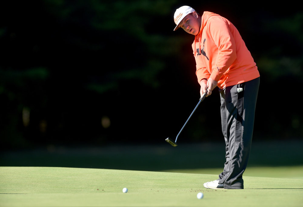 Erskine junior Aaron Pion putts during practice at Natanis Golf Course in Vassalboro on Wednesday. Pion and the Eagles will compete for a Class B state championship Saturday at Natanis.