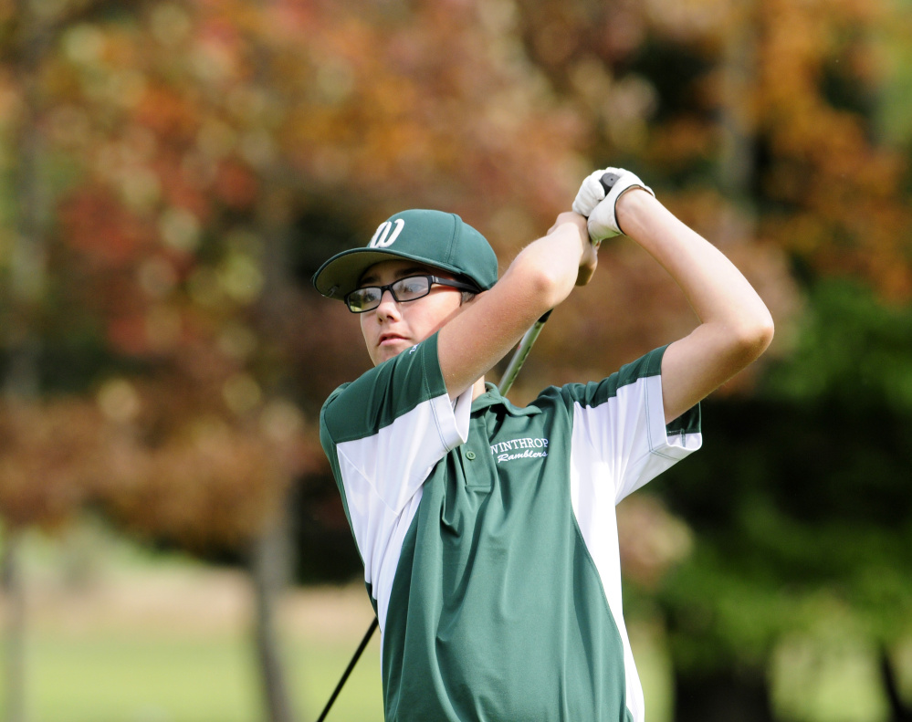 Staff photo by Joe Phelan 
 Winthrop golfer Zach Pray hits on the 9th fairway of Arrowhead during the state team championship Saturday at Natanis Golf Course in Vassalboro.