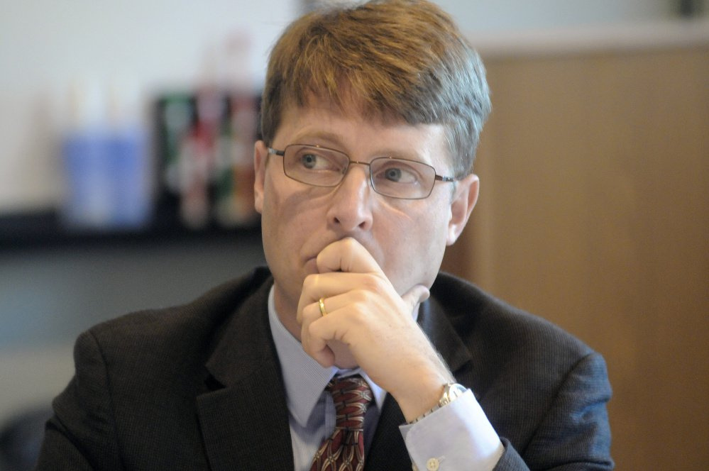 Bureau of Motor Vehicles hearing officer Ben Tucker listens Sept. 26 to Bryan Carrier's responses to questions during a hearing in Augusta.