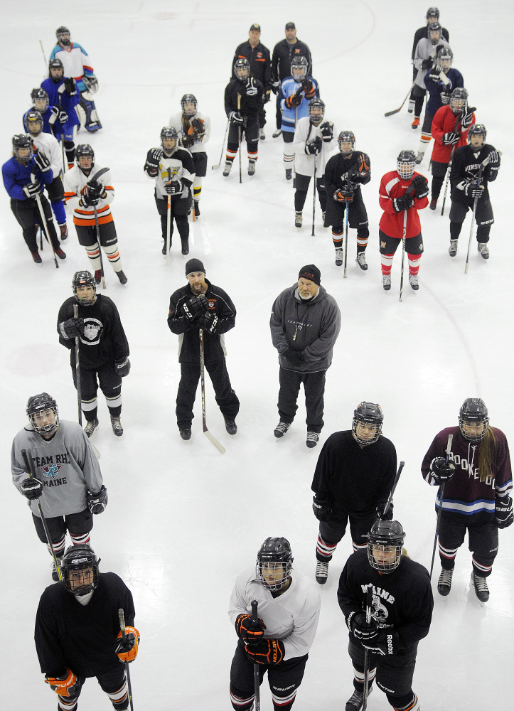 Winslow and Gardiner formed a girls co-operative hockey team this season, and the team is practicing at the Camden National Bank Ice Vault in Hallowell with Sukee Arena closed.