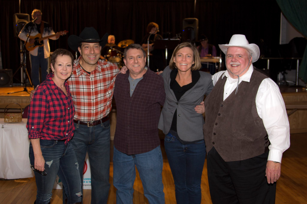 From left are Deb Violette, president and CEO, Free ME from Lung Cancer; Dave Eid; Dave Guillemette; Nikki Martin; and Roger Pomerleau. Eid, Guillemette and Pomerleau are board members.