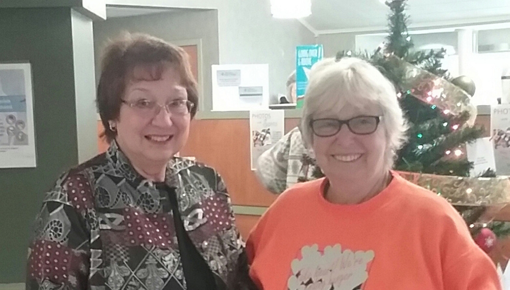 As part of the Maine Credit Unions' Campaign for Ending Hunger Walking Tour, Brenda Davis, right, one of the state's leading advocates for ending hunger, makes a stop at Winslow Community Federal Credit Union in Winslow. The credit union's Sharon Nadeau greets Davis. The stop was one of many in Kennebec County on the tour, which began in Augusta and also made stops in Gardiner, Monmouth, Oakland, Vassalboro, Waterville and Winthrop. The campaign made a contribution to food pantries in each community.