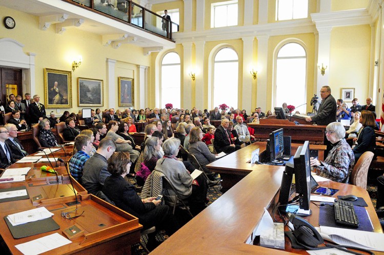 Gov. Paul LePage speaks before administering the oath of office to members of the 128th Legislature on the first day of the legislative session at the State House Wednesday.