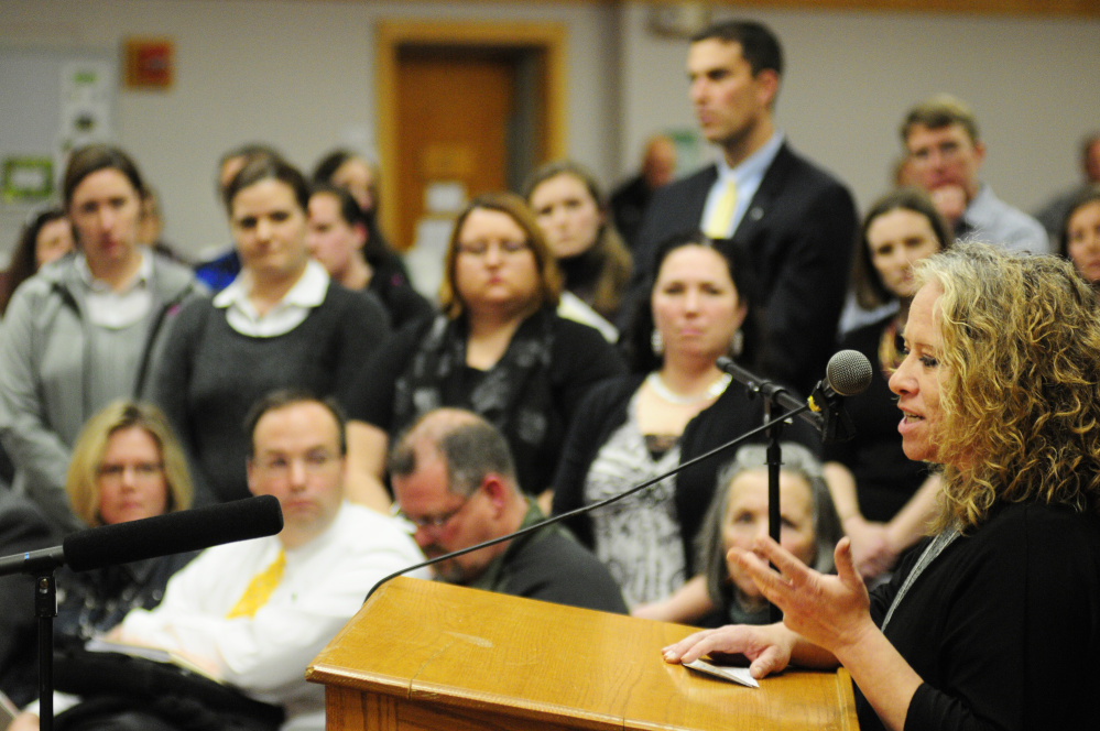 Manchester Elementary School teacher Jennie Galletta talks about health problems she's had that might have been connected to mold in the school during a Regional School Unit 38 School Board meeting last month at Maranacook Community School in Readfield.