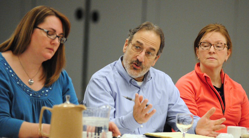 Augusta Board of Education Chairwoman Kim Martin, left, listens as School Superintendent James Anastasio speaks during the annual City Council goal setting meeting Jan. 28 at the Augusta Civic Center. At-Large City Councilor Marci Alexander is at far right.