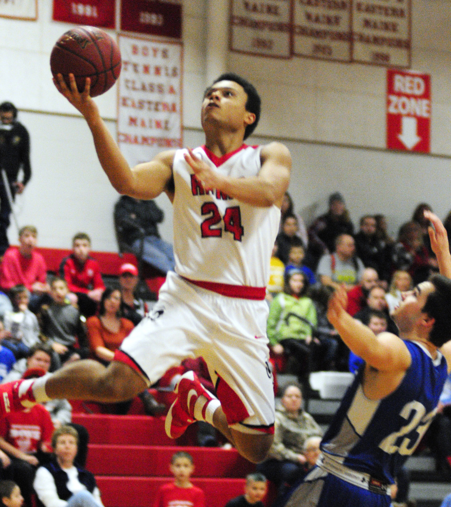 Cony guard Jordan Roddy goes up for a shot during a game against Lawrence this season. Roddy and the Rams host Erskine in a Class A North prelim game Thursday night.