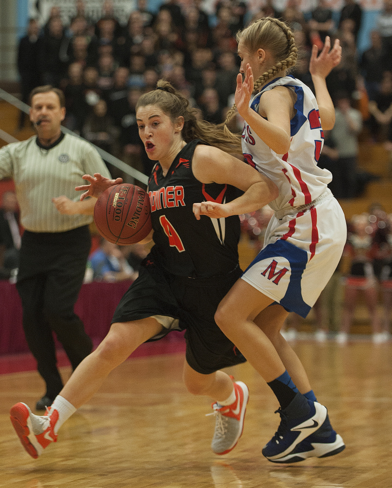 Gardiner's Lauren Chadwick brings the ball down the floor as Messalonskee's Ally Turner defends during a Class A North quarterfinal game Friday at the Augusta Civic Center.