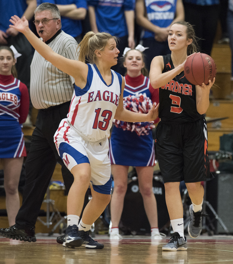 Messalonskee senior Lydia Dexter defends Gardiner's Mikayla Bourassa during a Class A North quarterfinal game against Gardiner at the Augusta Civic Center.