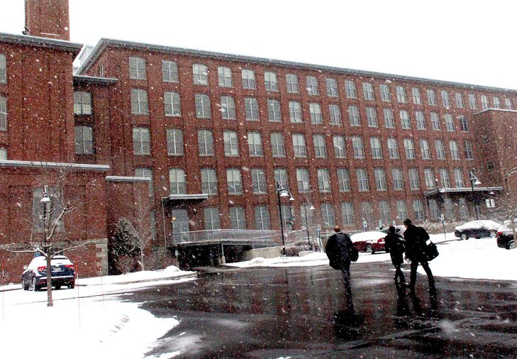 People enter the Hathaway Creative Center in Waterville on Dec. 5. The building has been sold for $20 million.