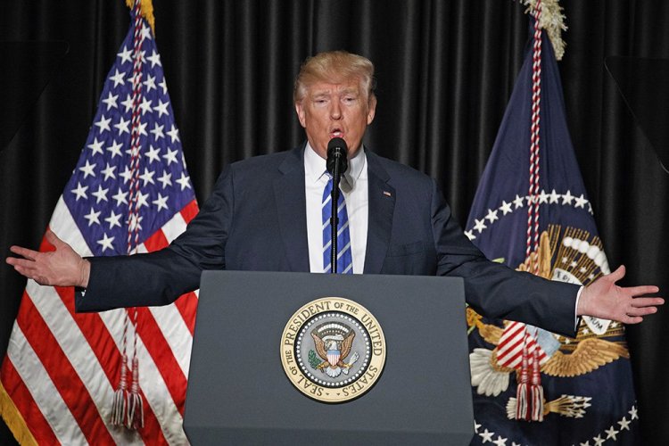 President Donald Trump speaks to the Major County Sheriffs' Association and Major Cities Chiefs Association, Wednesday, Feb. 8, 2017, in Washington. (AP Photo/Evan Vucci)