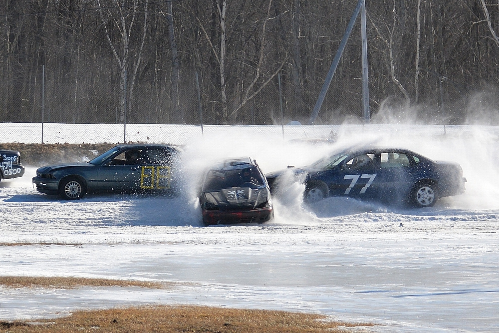 Several cars kick up some snow during the Snowbowl Enduro 100 at Unity Raceway on March 5.