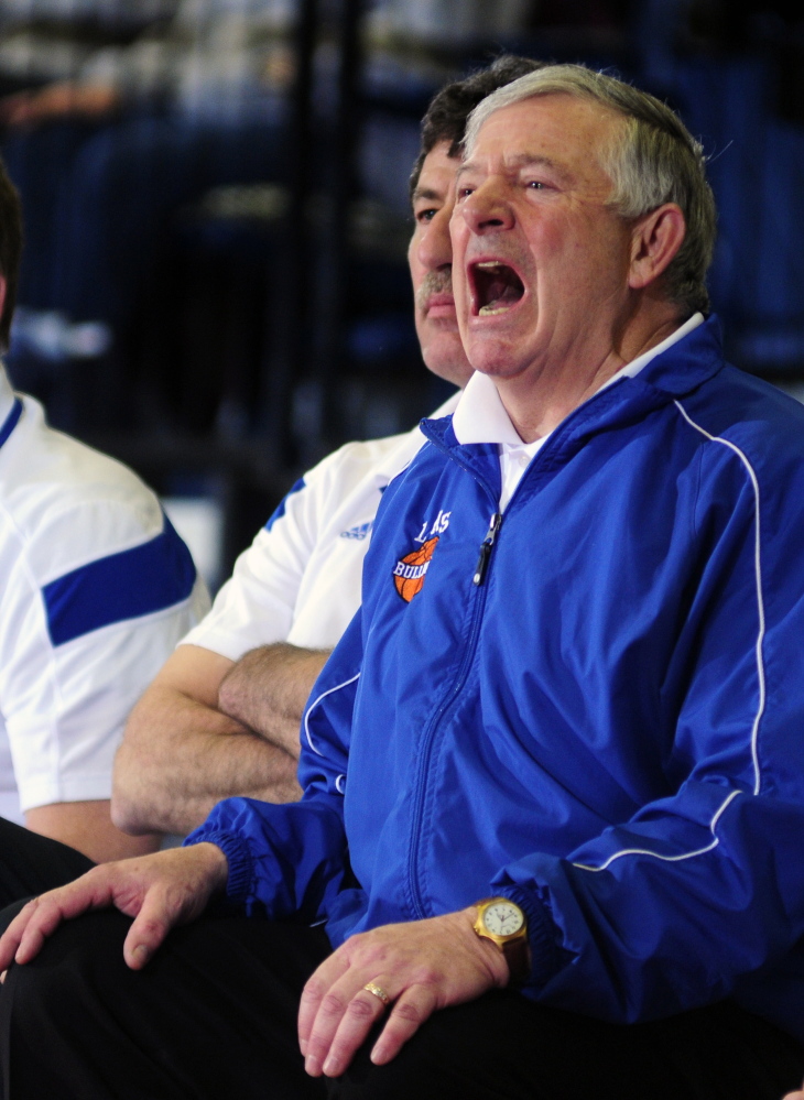 Lawrence girls basketball coach John Donato yells instructions to his team during a 2016 regional quarterfinal game against Messalonskee.