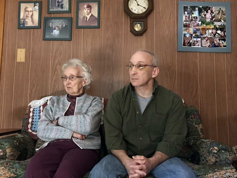 Audrey Hewitt and her son Eric Hewitt take part in an interview Friday in Audrey Hewitt's Sidney home.