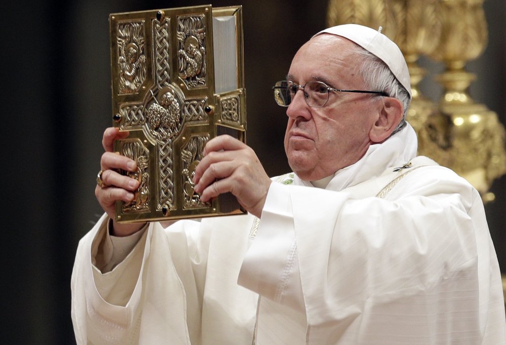 Pope Francis presides over a solemn Easter Vigil ceremony in St. Peter's Basilica at the Vatican on Saturday. 
Associated Press/Andrew Medichini