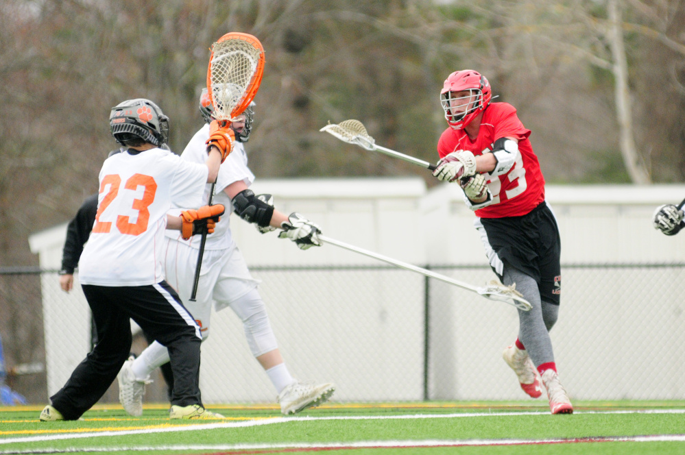 Cony's Nick Robinson scores on Gardiner keeper Noah Keene during a Kennebec Valley Athletic Conference Class B game Thursday at Lincoln Academy in Newcastle.