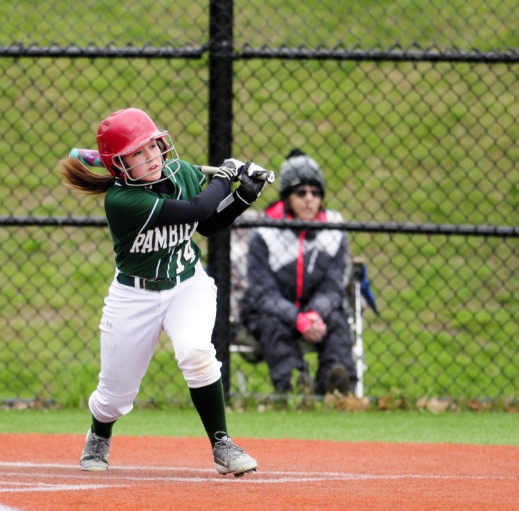 Moriah Hajduk clobbers a two-run triple to tie the score at 2-2 in the third inning Tuesday against Monmouth Academy in a game played at Kents Hill School.