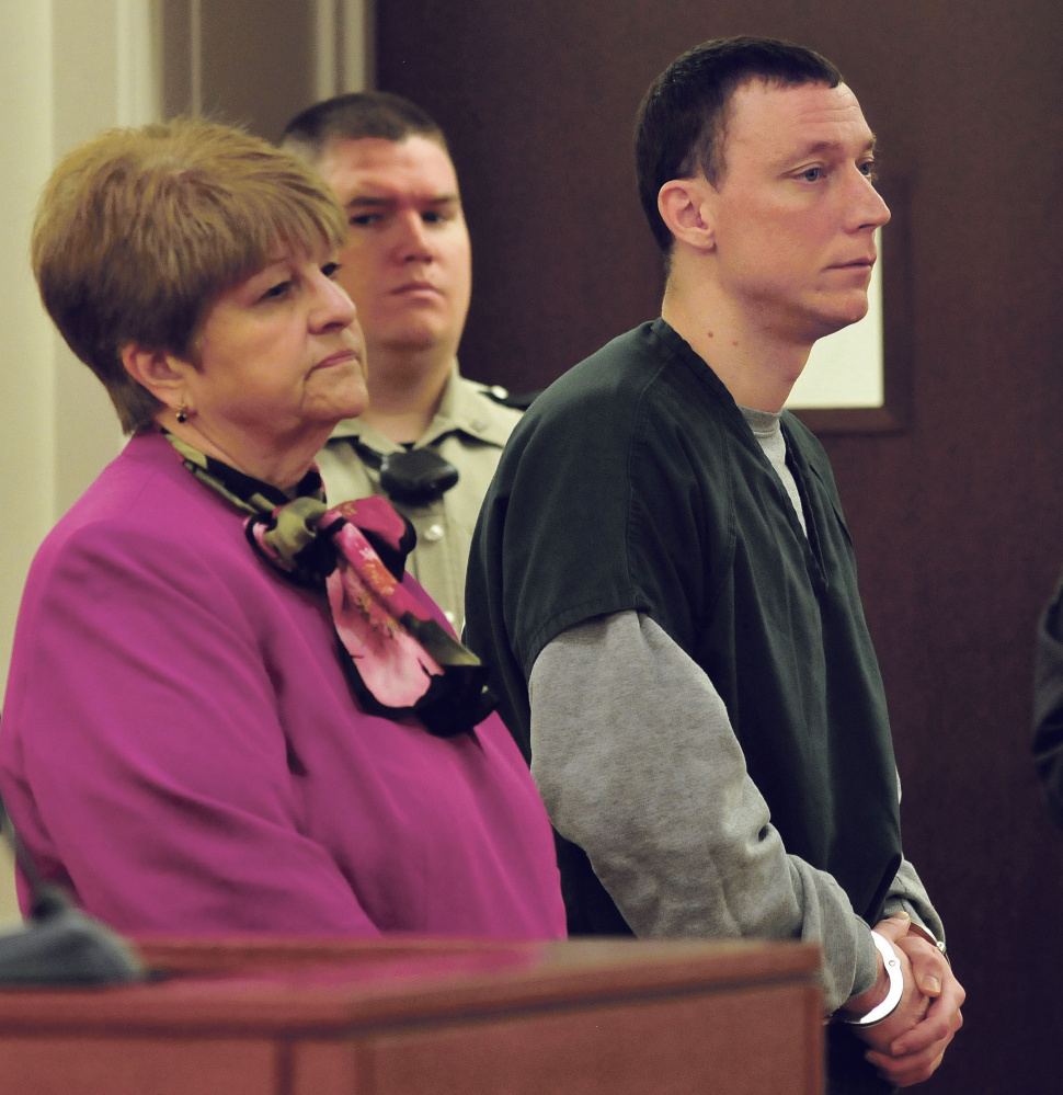 Defendant Mark D. Halle answers questions from Justice William Stokes during a Monday hearing at the Capital Judicial Center in Augusta. Halle was sentenced to 27 years in prison after his convictions for gross sexual assault, burglary and criminal threatening with a dangerous weapon after he attacked a woman at her at her home in Waterville in 2016. Beside Halle is his attorney Pamela Ames.