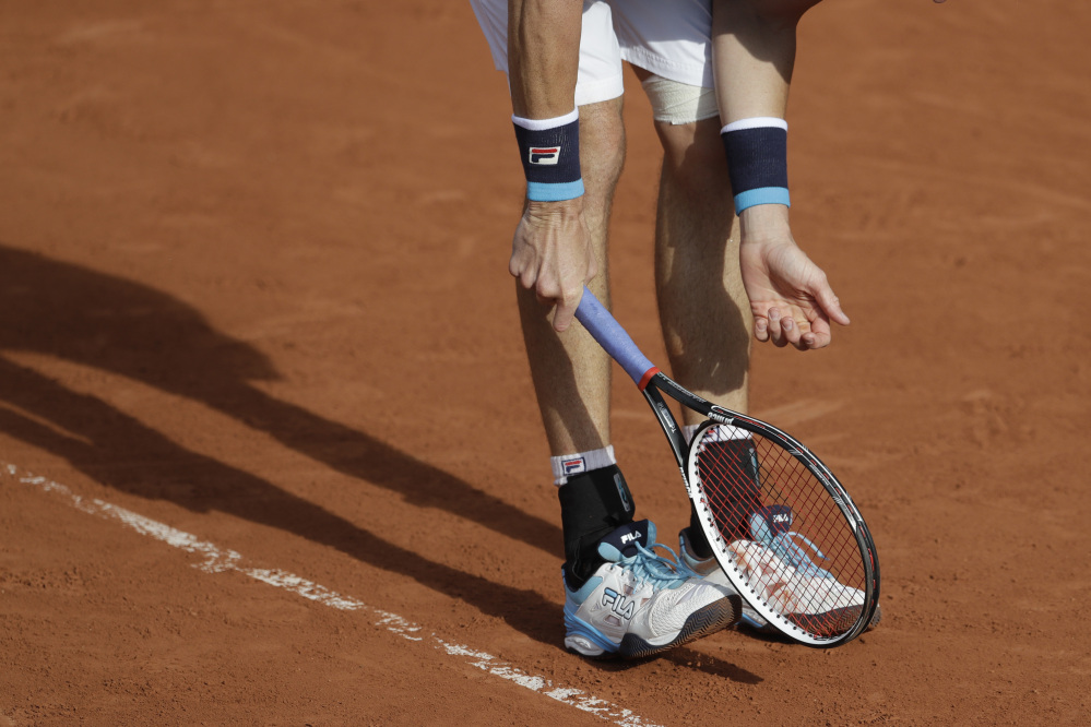 John Isner gestures after missing a shot against Australia's Jordan Thompson in their first round match of the French Open on Tuesday.