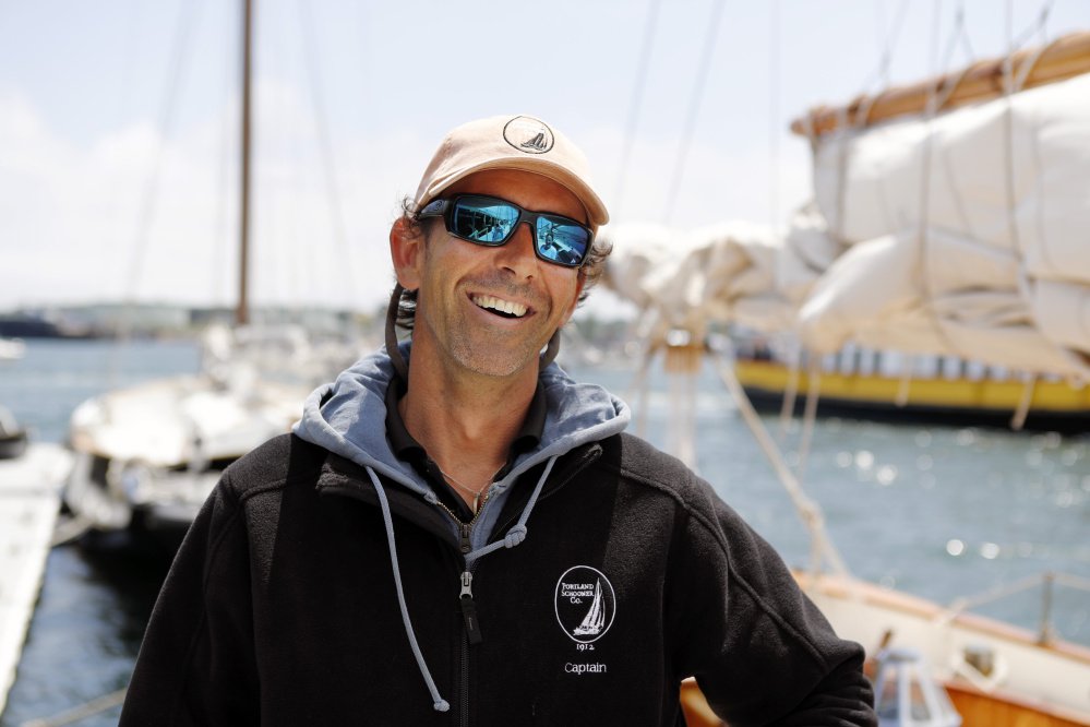 Sean Canniff, captain of the schooner Wendameen speaks Sunday in Portland Harbor.