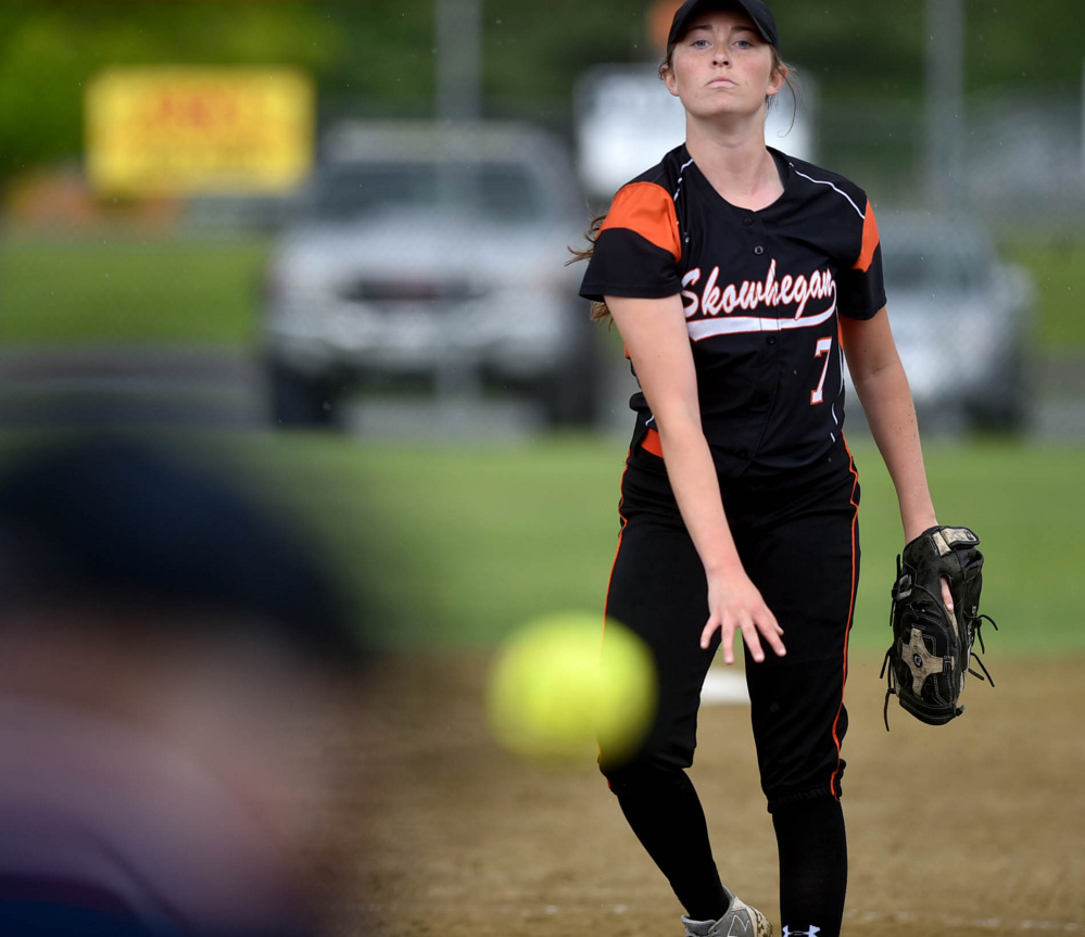 Skowhegan pitcher Ashley Alward delivers a pitch to an Edward Little High School batter during the Kennebec Valley Athletic Conference Class A title game Friday.