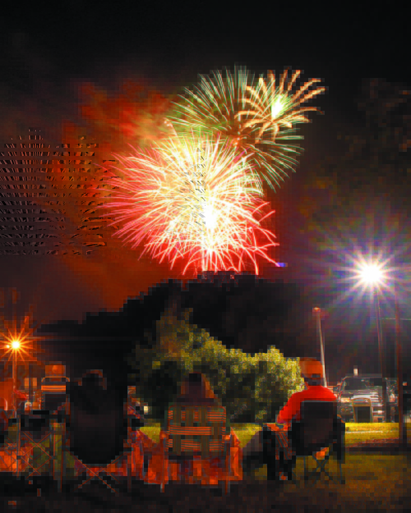 Fireworks that were part of the Winslow Family 4th of July Celebration light up the sky on July 4, 2012, over the Hathaway Creative Center in Waterville.