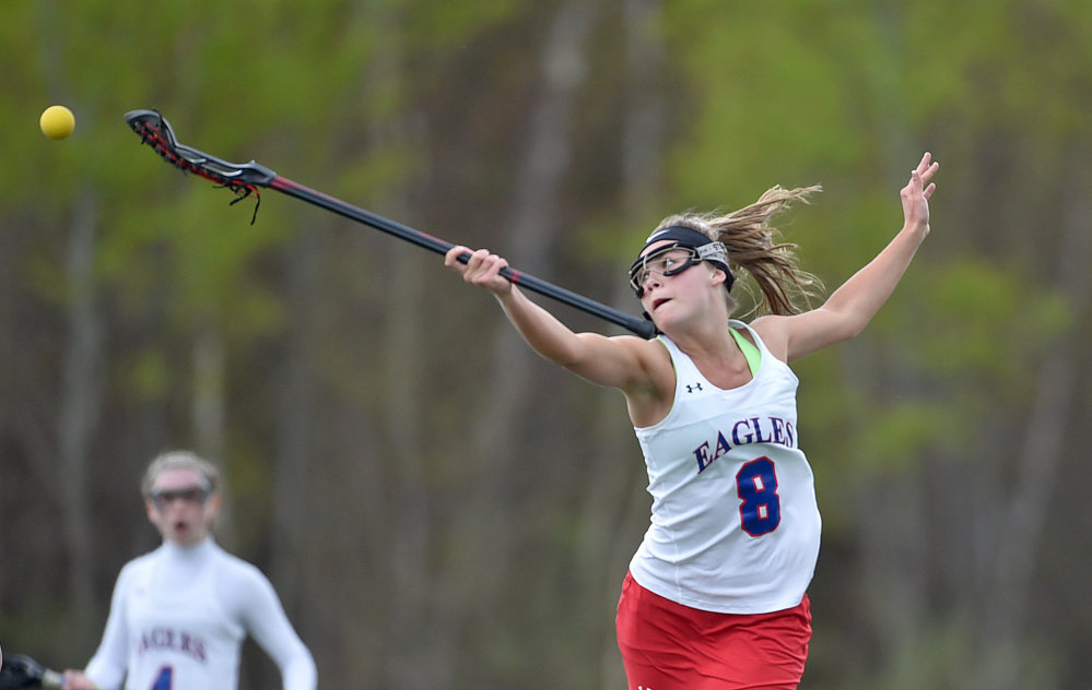 Messalonskee's Lauren Pickett stretches for the ball in the first half of a Kennebec Valley Athletic Conference Class A game against Lewiston earlier this season at Thomas College.