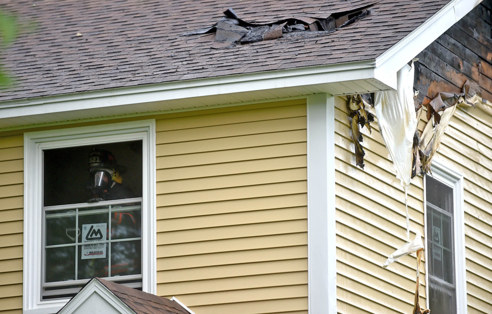 Firefighters from multiple agencies fought a house fire Thursday at 1191 Lakeview Drive in China.