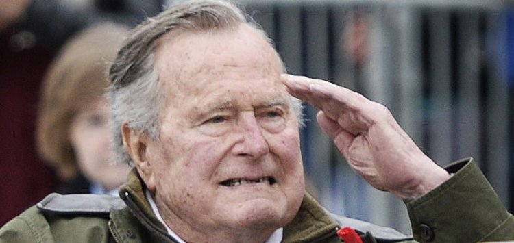 KENNEBUNKPORT, ME - MAY 29: Former first lady Barbara Bush claps and former president George Bush salutes as the Memorial Day Parade in Kennebunkport goes by Monday, May 29, 2017. (Staff photo by Shawn Patrick Ouellette/Staff Photographer)