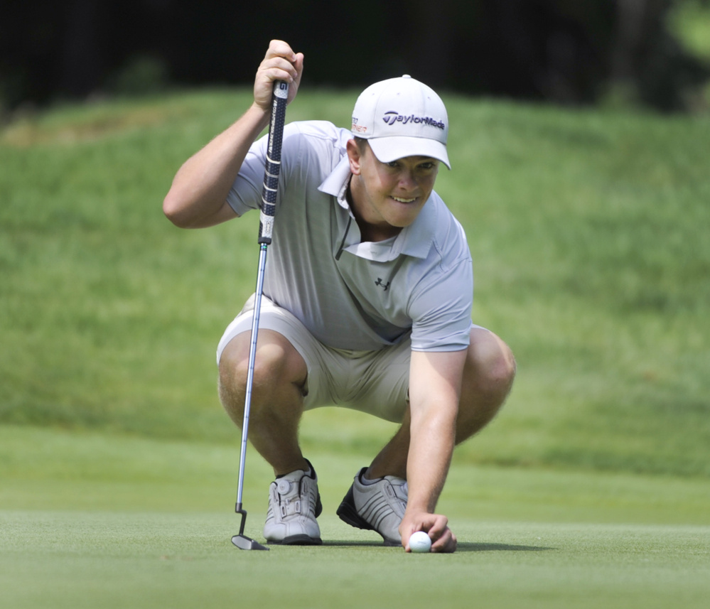 Jack Wyman lines up a putt on the 14th hole during the second round of the Maine Amateur on Wednesday in Brunswick.