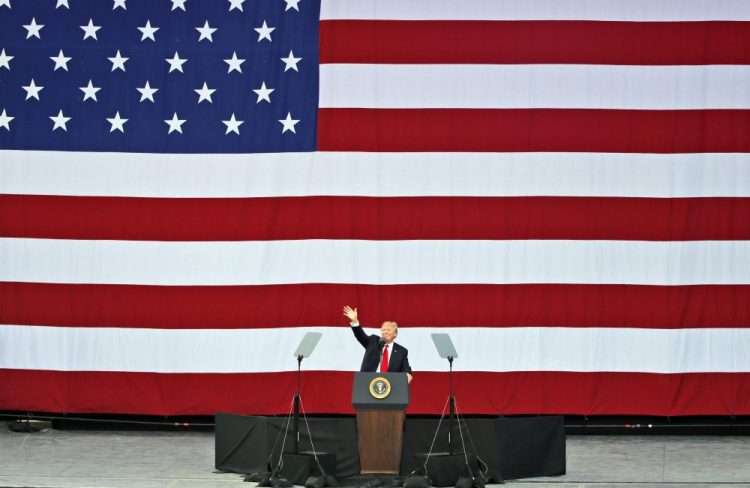 President Trump waves as he addresses the scouts at the 2017 National Boy Scout Jamboree at the Summit in Glen Jean, W.Va., Monday. 