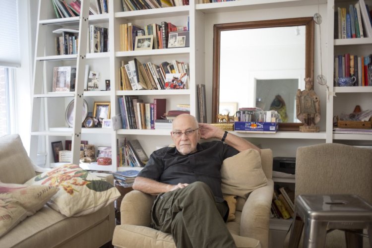 Waite Maclin at his home in Portland. Maclin has arranged an exhibition of works by his wife, Christine, who died of cancer last year. Christine Maclin pursued her passion, Chinese brush painting, at Maine College of Art, where the show goes on view this week. Below, examples of her art.