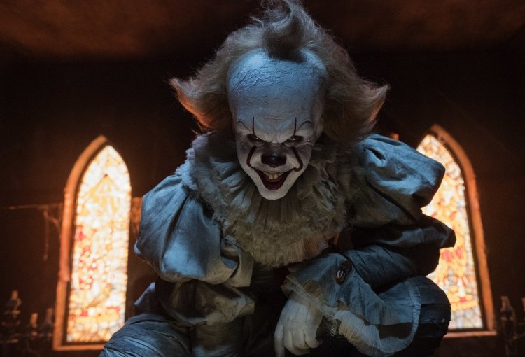 Bill Skarsgard appears in a scene from "It."