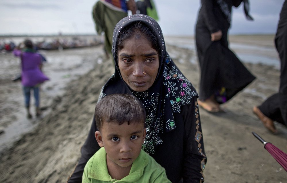 Tears roll down the cheek of a Rohingya Muslim woman who crossed over the border from Myanmar into Bangladesh in Teknaf.