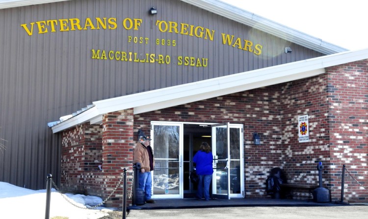 People enter and exit the Winslow VFW hall on March 31, 2015, after former bookkeeper Cara Bird was charged in connection with stealing money from the group. Bird, who was ordered in a civil judgment to pay $7,716 to the VFW, pleaded guilty Wednesday in a separate case to also embezzling $4,389 from the Winslow VFW Auxiliary.