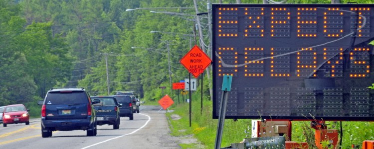 A file photo from 2015 warns motorists about the major construction project on Mount Vernon Avenue in Augusta, where a road crew currently is working on repairs to stonework along the busy corridor.