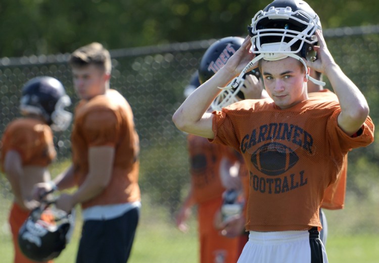 Staff photo by Andy Molloy 
 Gardiner safety Kolton Brochu prepares to lead stretches during practice Tuesday at the high school. The diabetic captain of the team checks his blood several times during practices and games and carries emergencies supplies, including Insulin.