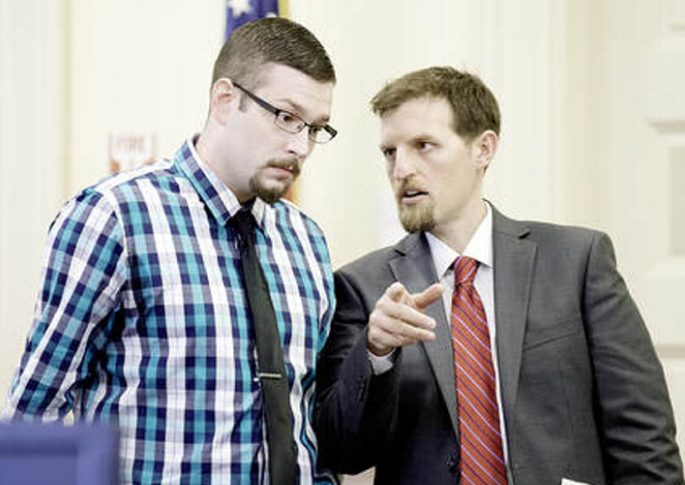 Timothy Danforth, left, talks with his co-counsel, Jeffrey Wilson, prior to the start of Danforth's murder trial in Franklin County Superior Court on Monday.