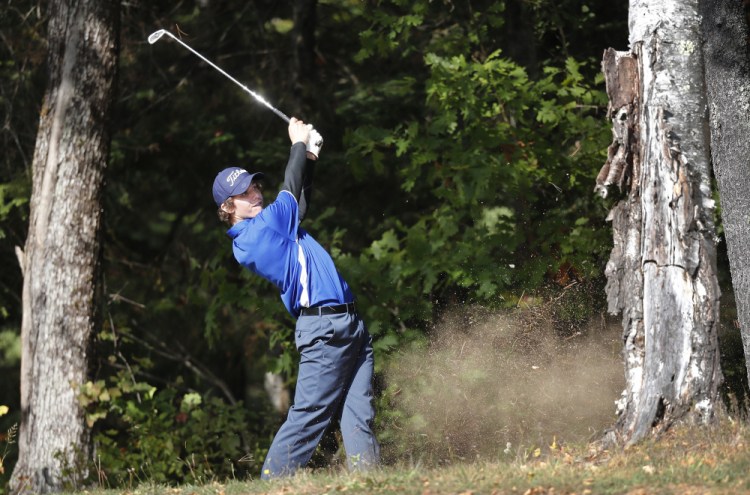 Connor Paine of Erskine drives from off a fairway during the state individual golf championships Saturday at Natnis Golf Course.