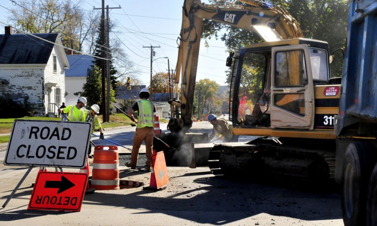 Construction continues Wednesday on North Avenue in Skowhegan. Customers of George's Banana Stand call navigating their way to the market a "pain in the butt" as they find themselves confused by the signage or forced to take a long drive to get to what normally is a nearby market.