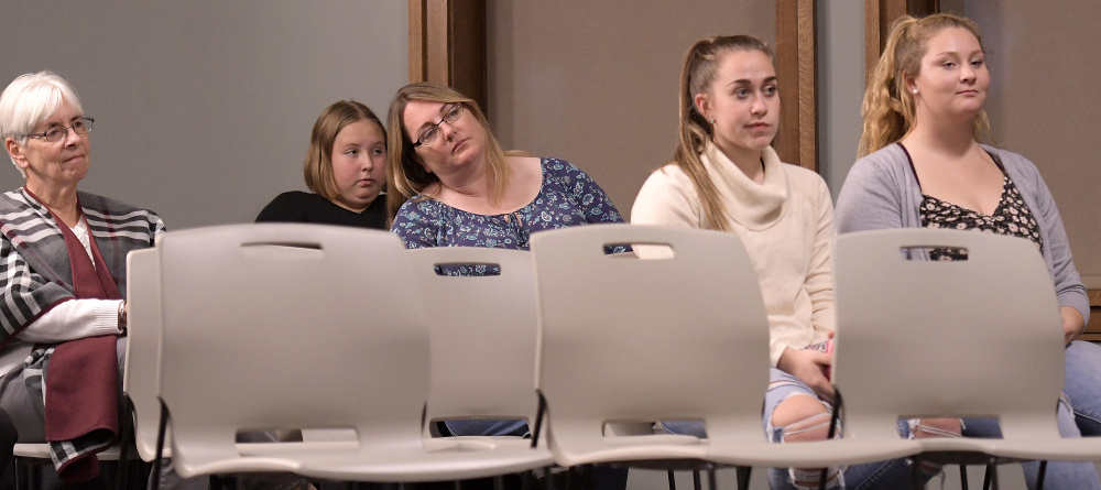 People listen to Augusta School Board candidates answer questions Wednesday during a forum held at Lithgow Public Library in Augusta.