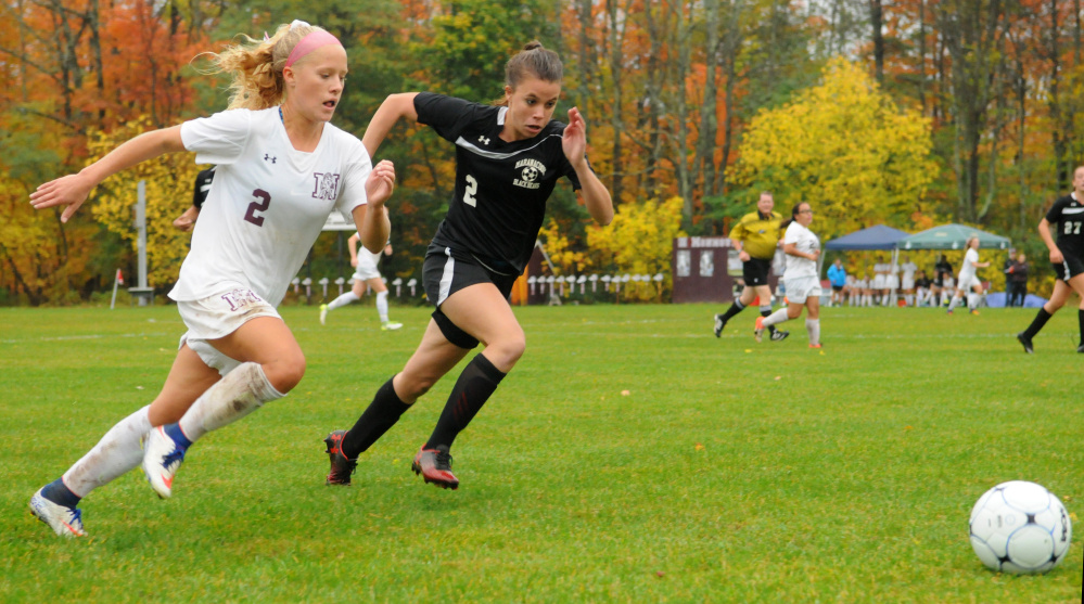 Monmouth's Audrey Fletcher, left, and Marancook's Naomi Moulton chase down a ball during a Class C South quarterfinal game Tuesday at Monmouth Academy.