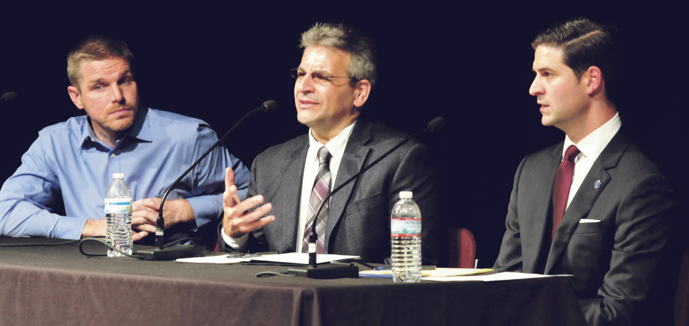 Candidates for Waterville mayor take part in a debate Tuesday night at Thomas College in Waterville. From left are Erik Thomas, John Levesque and Nick Isgro.