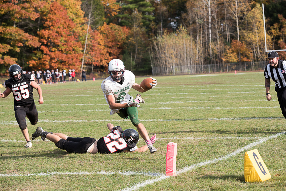 Winthrop/Monmouth's Cameron Gaghan dives into the end zone in the final minutes against Lisbon in a Class D South quarterfinal game  Saturday in Lisbon.