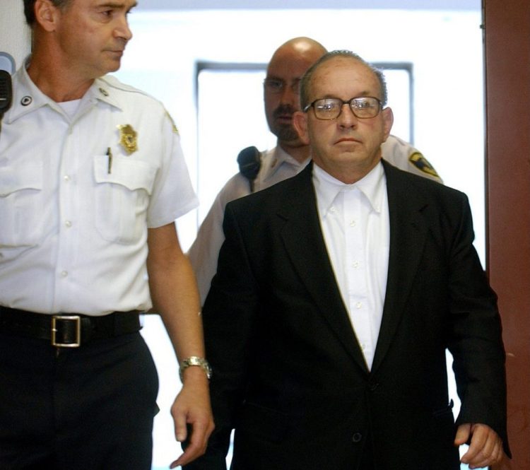 Pictured at an arraignment in Boston on Sept. 19, 2002, James F. Talbot was extradited this week from Missouri to Maine to face sexual abuse charges in a 1997-98 Freeport case.