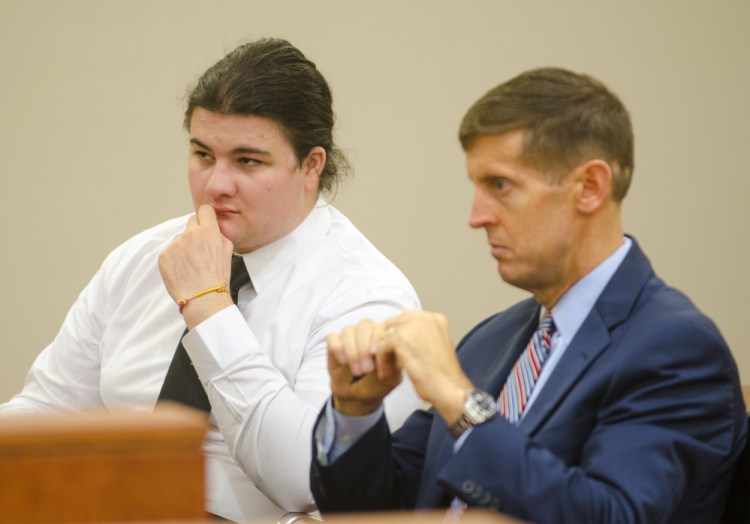 Andrew Balcer, left, sits with his attorney Walter McKee during a hearing Oct. 26 at the Capital Judicial Center in Augusta. On Thursday, a judge ruled he should be tried as an adult on charges that he murdered both his parents last year in their Winthrop home.