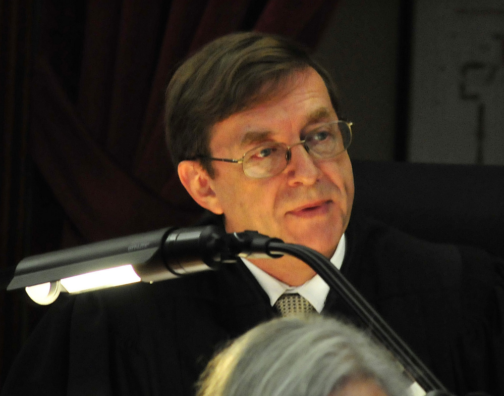 Justice Robert Murray instructs the jury during the manslaughter trial of Miranda Hopkins of Troy in the death of her son Jaxson in Waldo County Superior Court in Belfast on Monday.